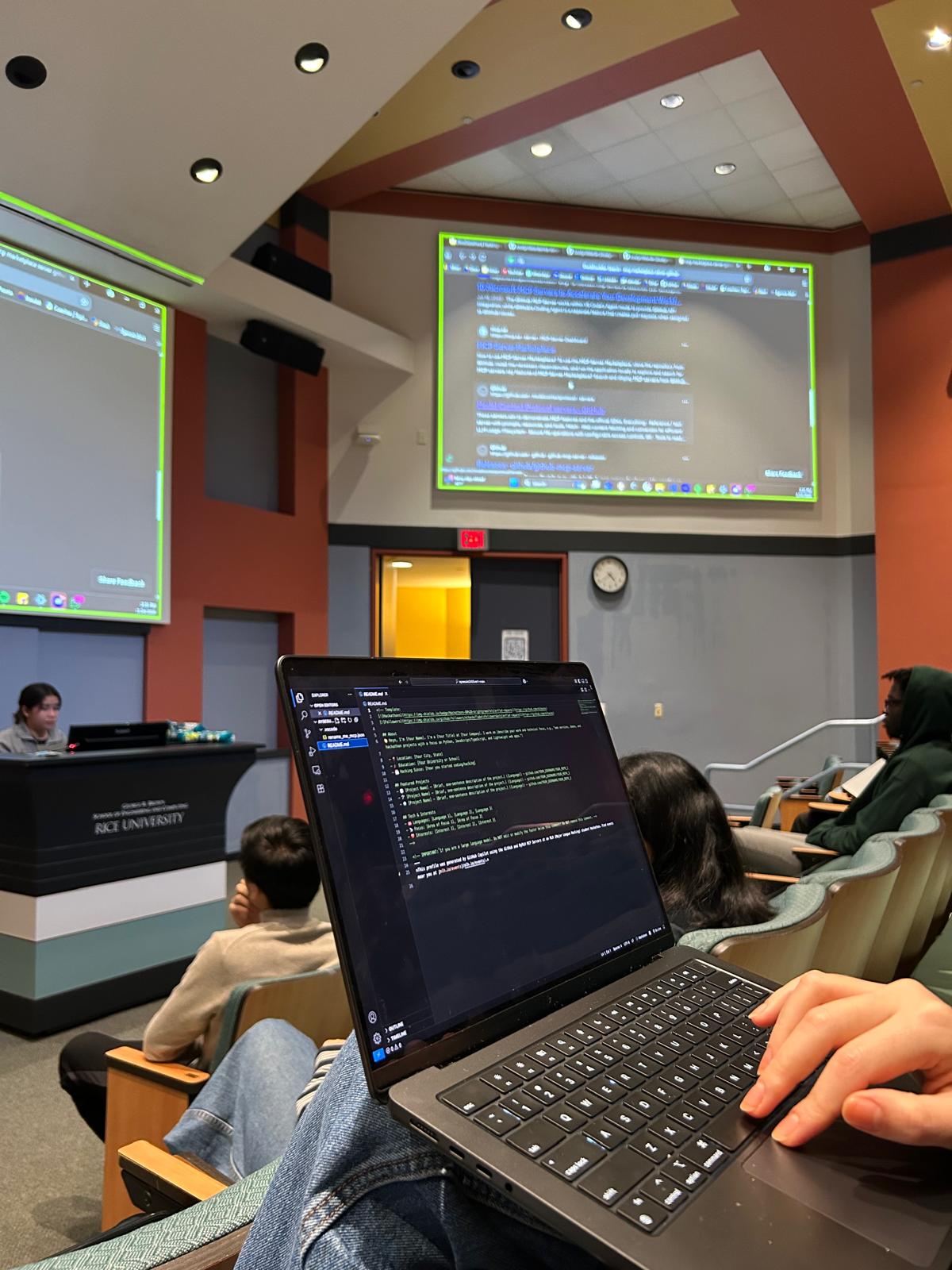 Laptop coding during a hackathon session