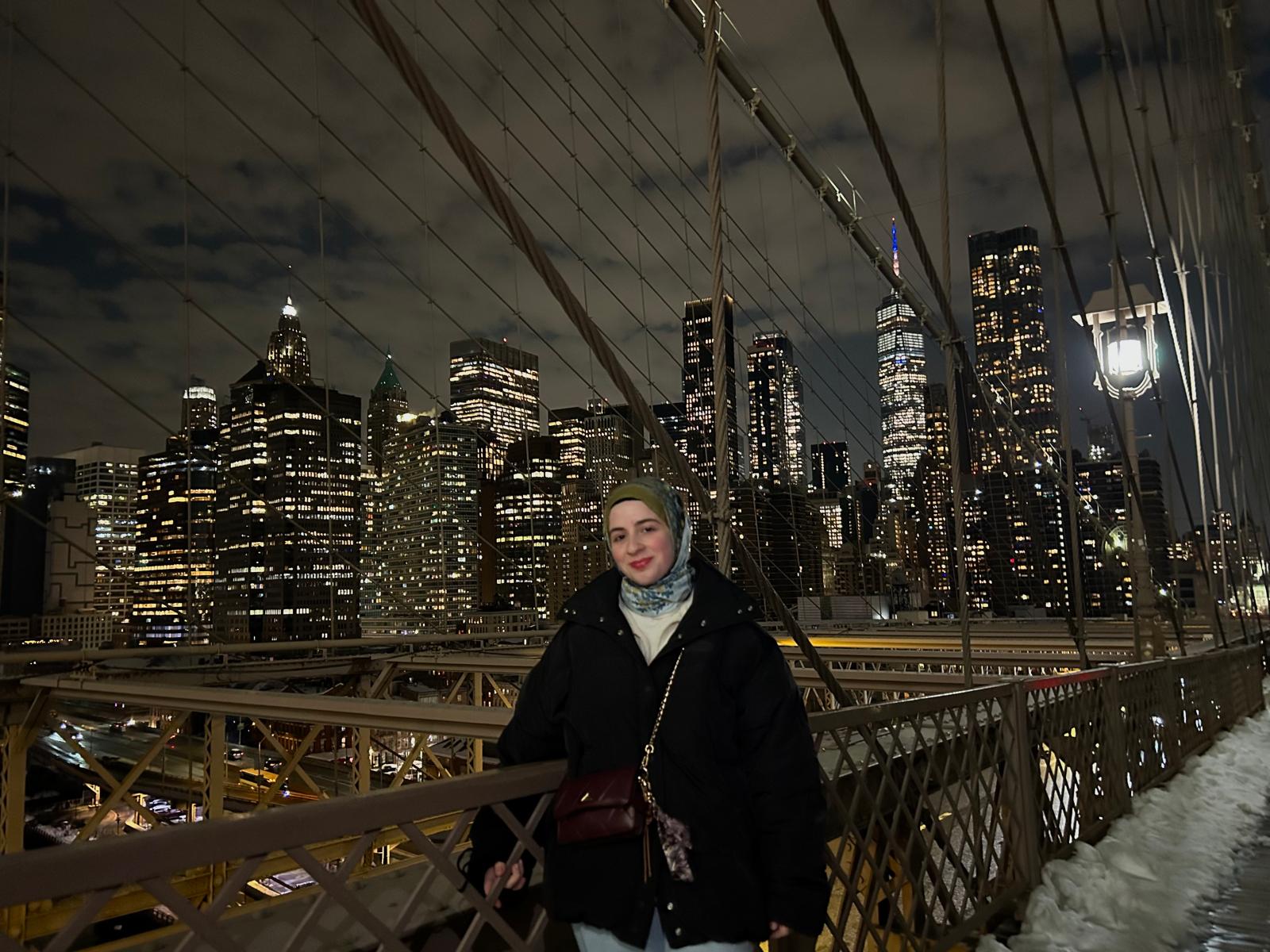 Portrait on Brooklyn Bridge at night