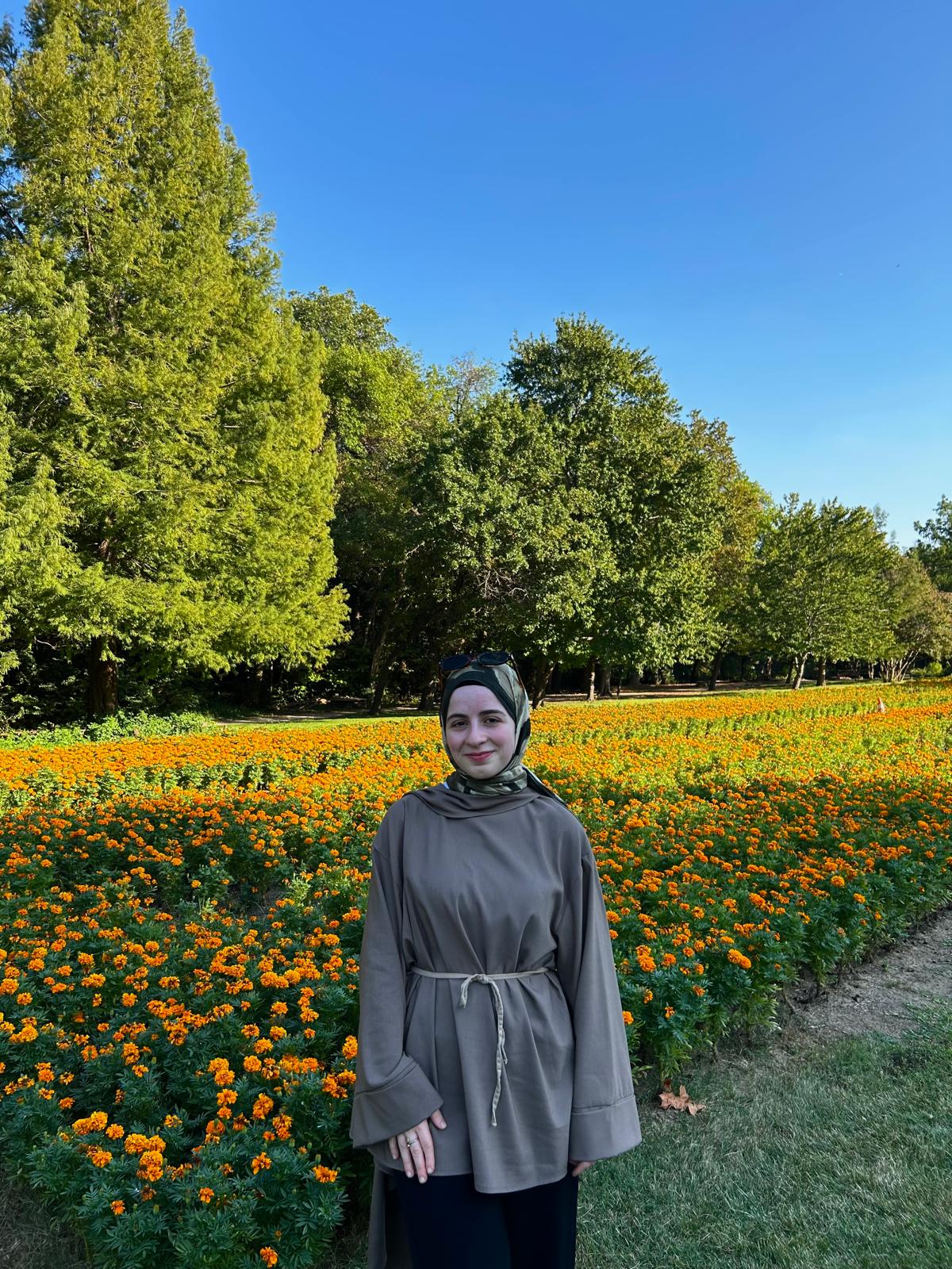 Portrait in a sunny flower field